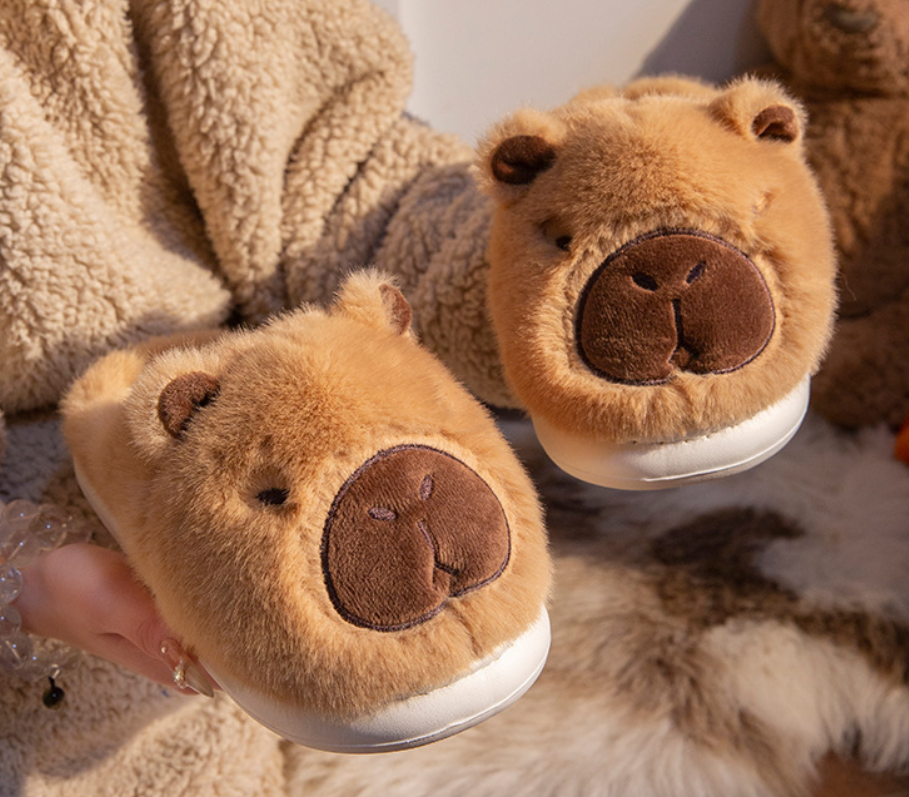 Cozy capybara slippers for indoors with soft cotton material and cute capybara face design.